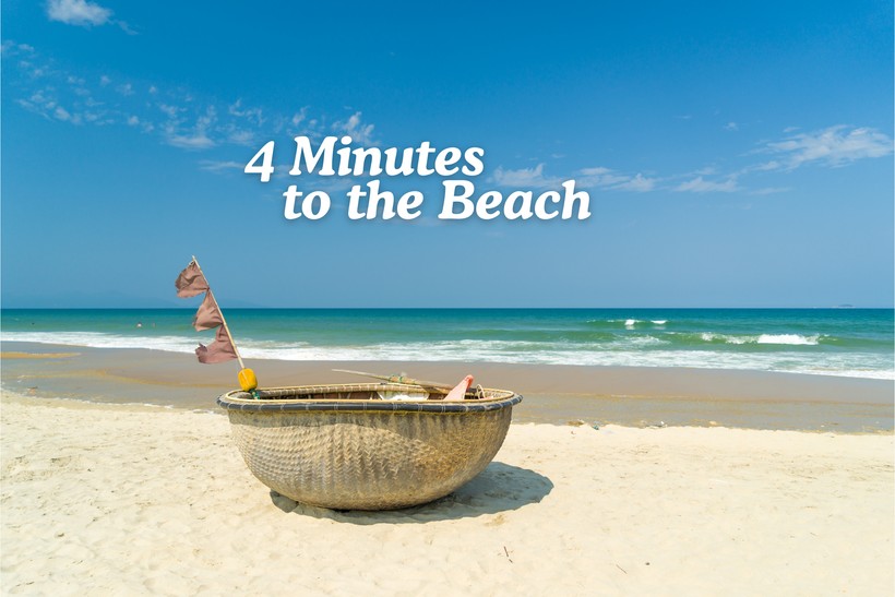 Schild am An Bang Beach: 4 Minuten zum Strand